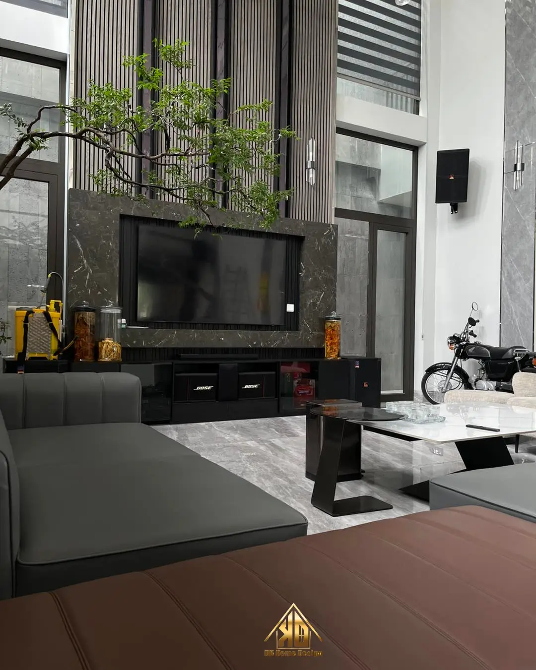 Ý tưởng thiết kế nội thất phòng khách nhà phố liền kề đẹp tại Đô Lương 2 Không gian phòng khách đẹp đẳng cấp với vách ốp tivi gỗ công nghiệp