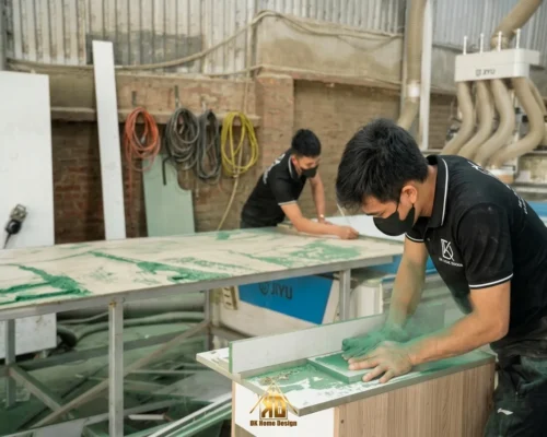 Đơn vị thi công nội thất phòng khách Đô Lương, Nghệ An bằng gỗ công nghiệp: Báo giá minh bạch, chất lượng năm 2026 41 Thợ mộc làm nội thất Đô Lương tay nghề cao